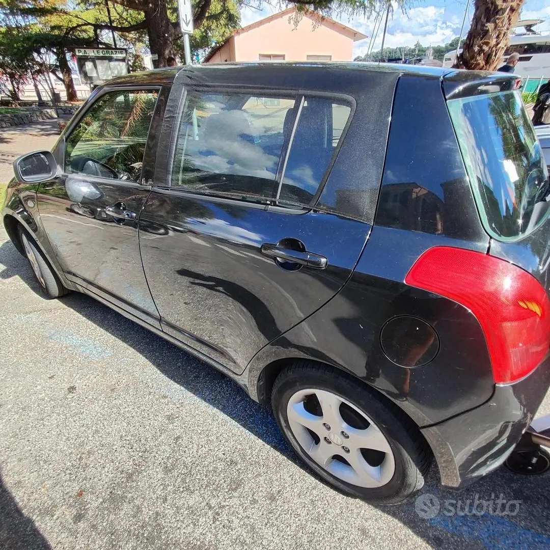 Suzuki Swift 2006 photo 2