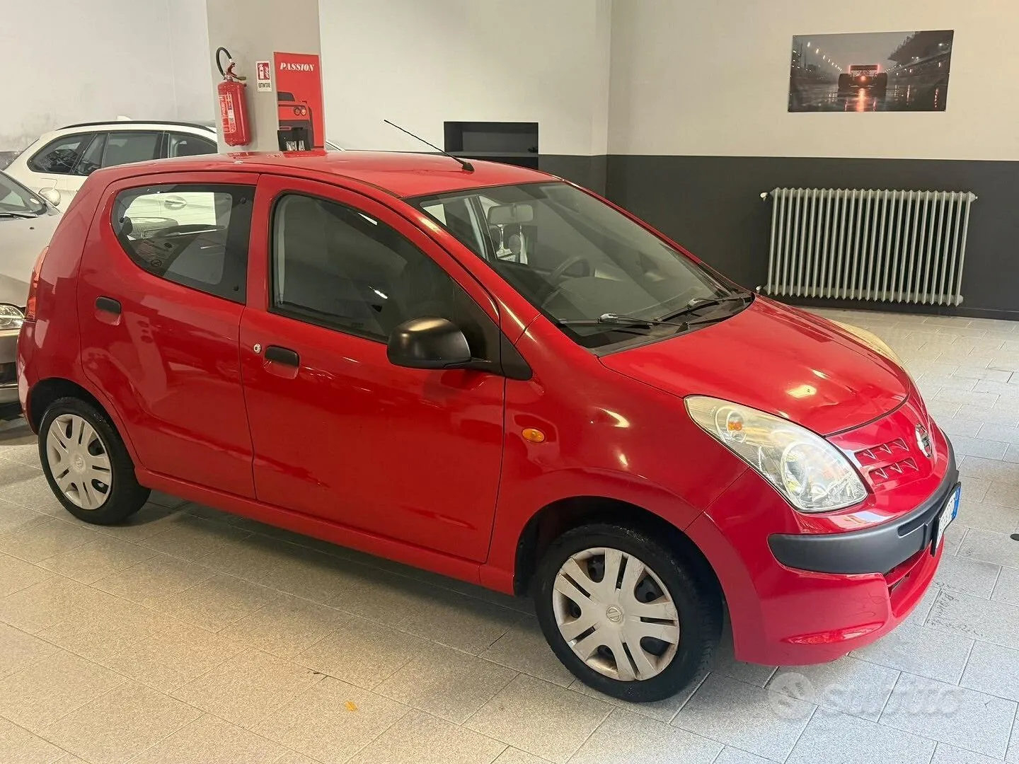 Nissan Pixo 2010 photo 2