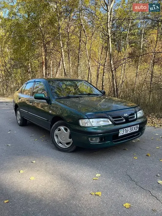 Nissan Primera 1997 photo 2