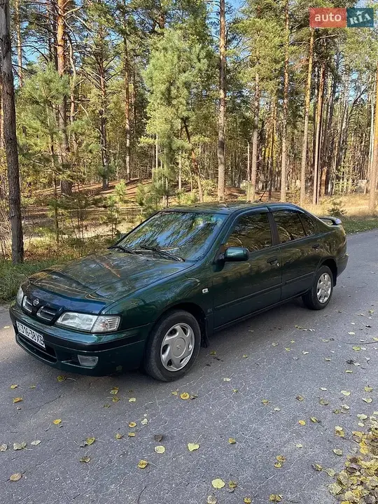 Nissan Primera 1997 photo 4