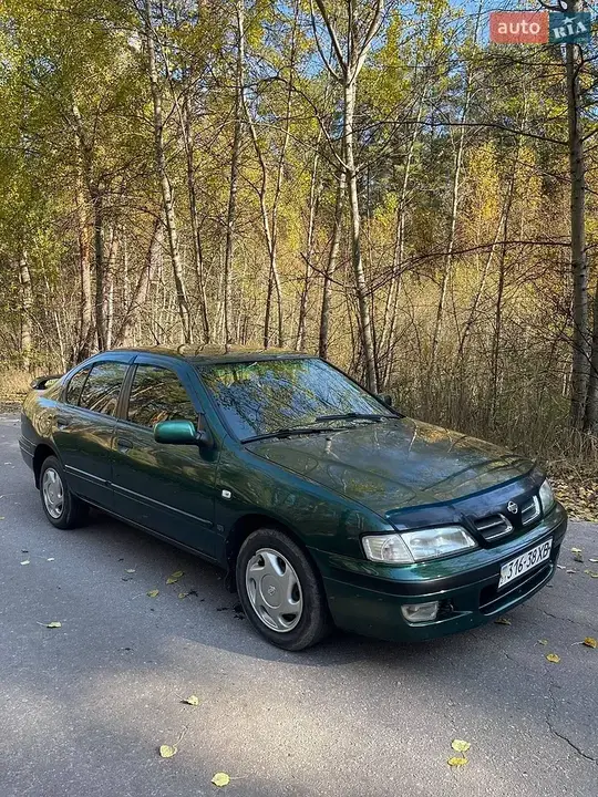 Nissan Primera 1997 photo 3
