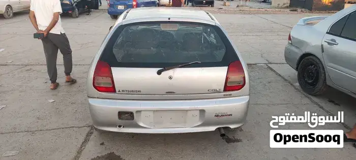 Mitsubishi Colt 2004 photo 2