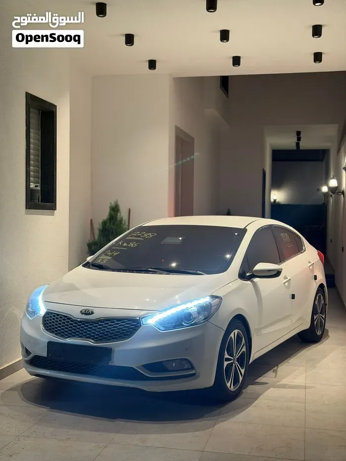 Kia K3 2014 photo 2