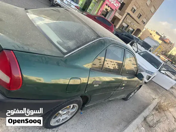 Mitsubishi Lancer 1997 photo 2