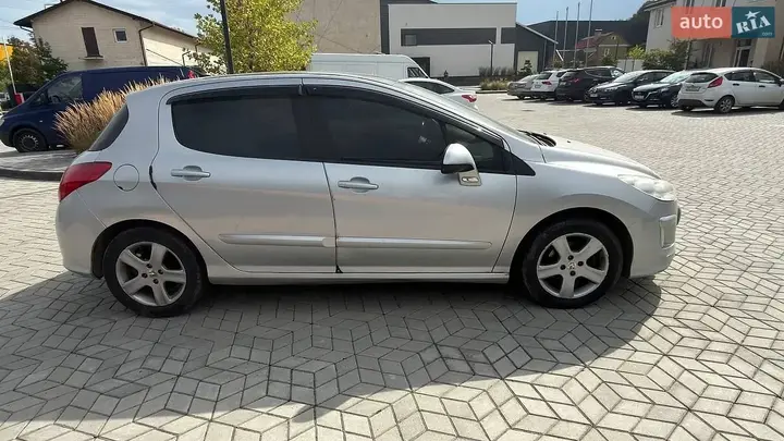 Peugeot 308 2009 photo 4