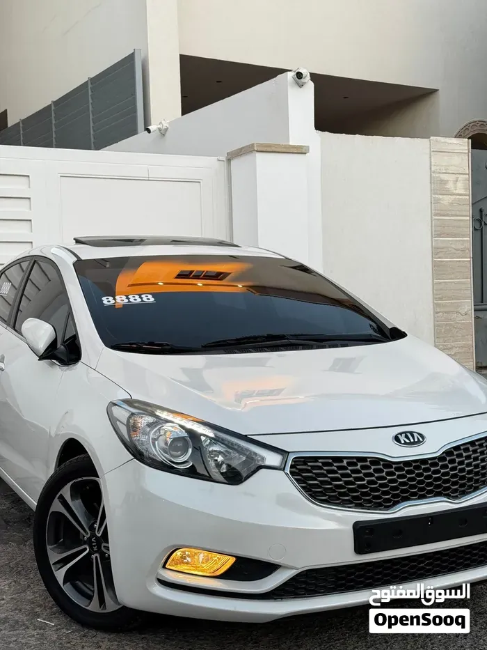 Kia K3 2013 photo 3