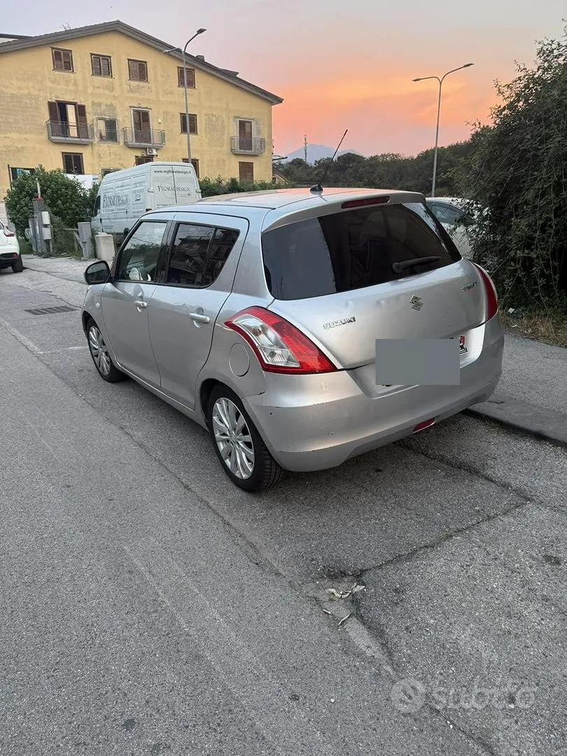 Suzuki Swift 2010 photo 3