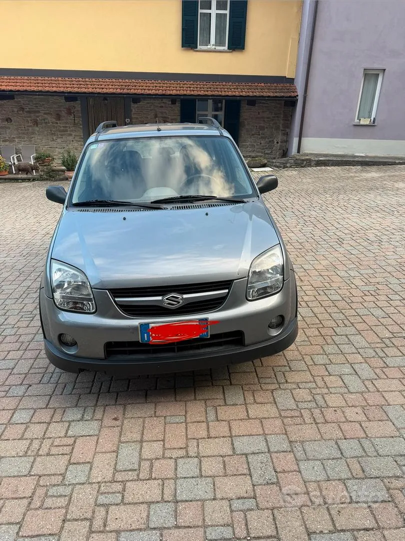 Suzuki Ignis 2009 photo 2