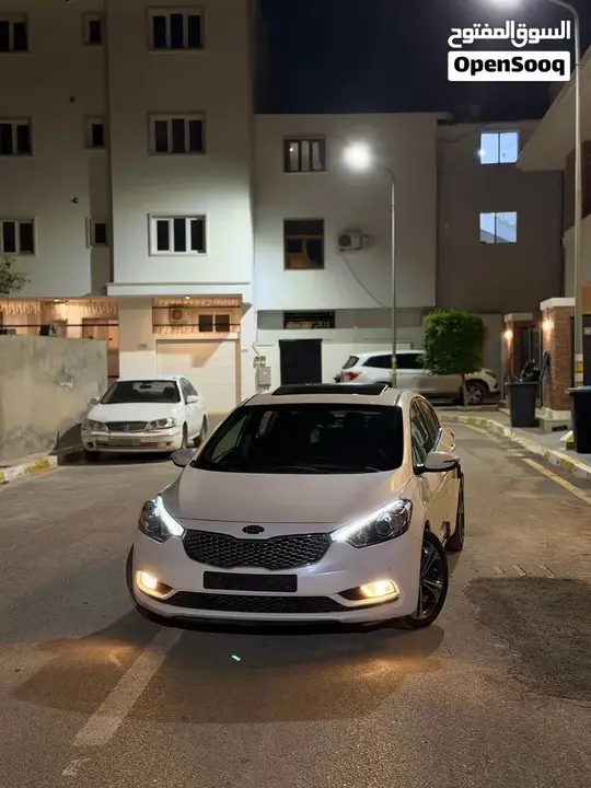 Kia K3 2014 photo 2
