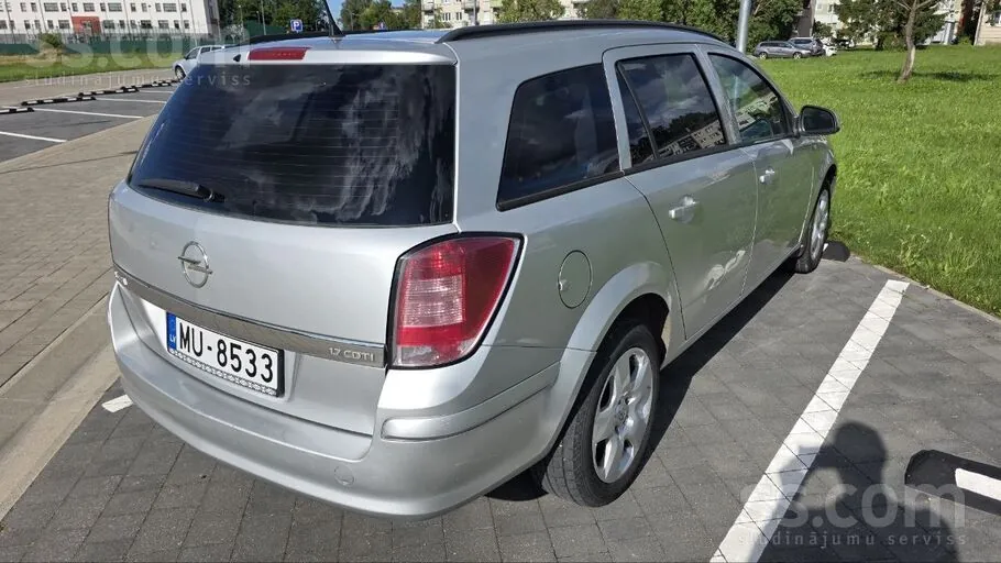 Opel Astra Caravan 2013 photo 3