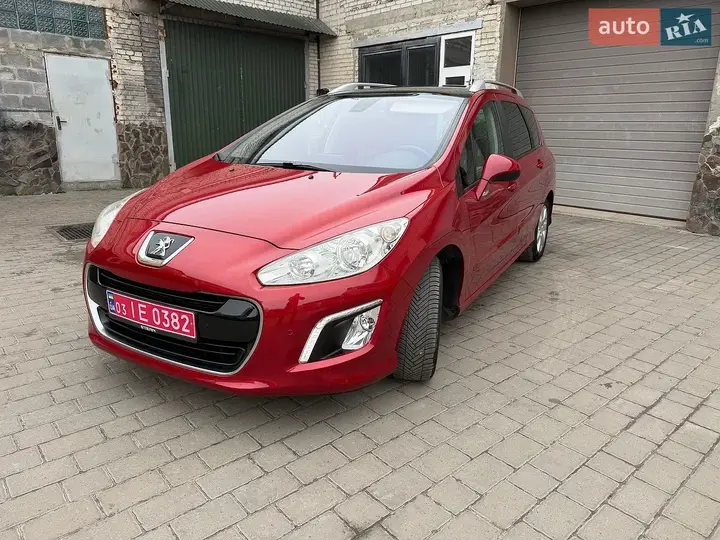 Peugeot 308 2012 photo 2