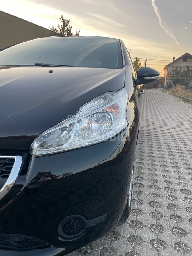 Peugeot 208 2014 photo 4