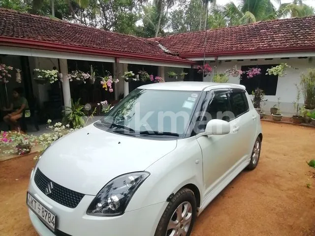 Suzuki Swift 2010 photo 2
