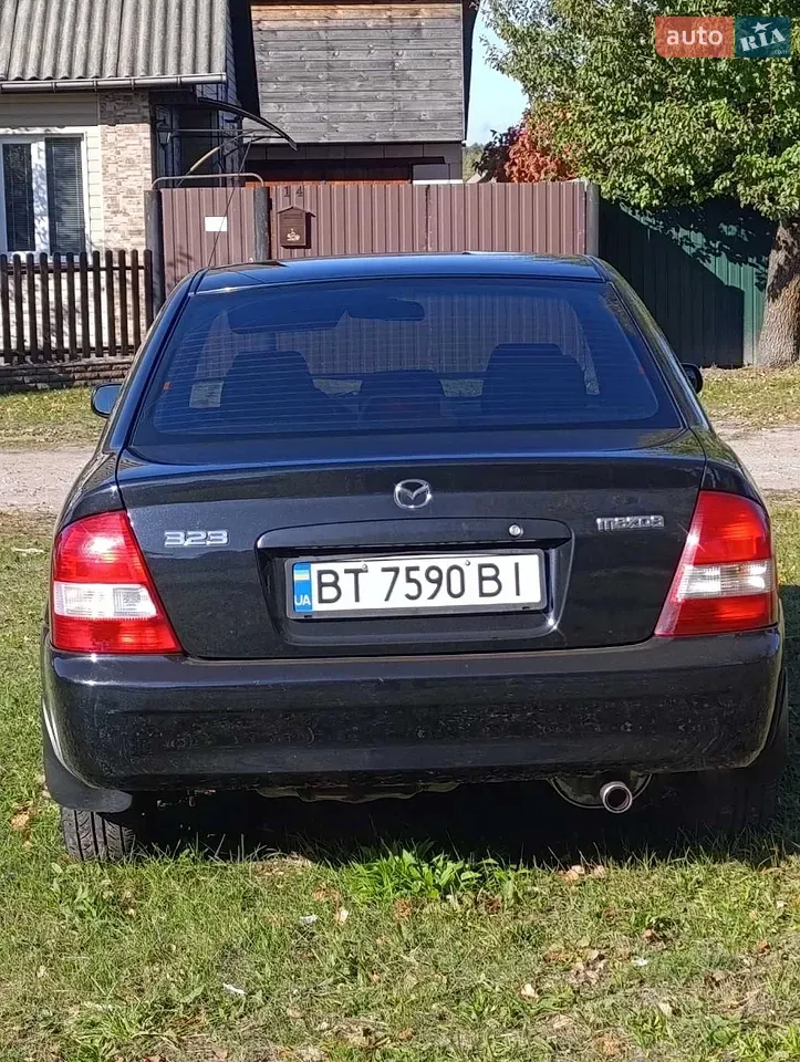 Mazda 323 2003 photo 3