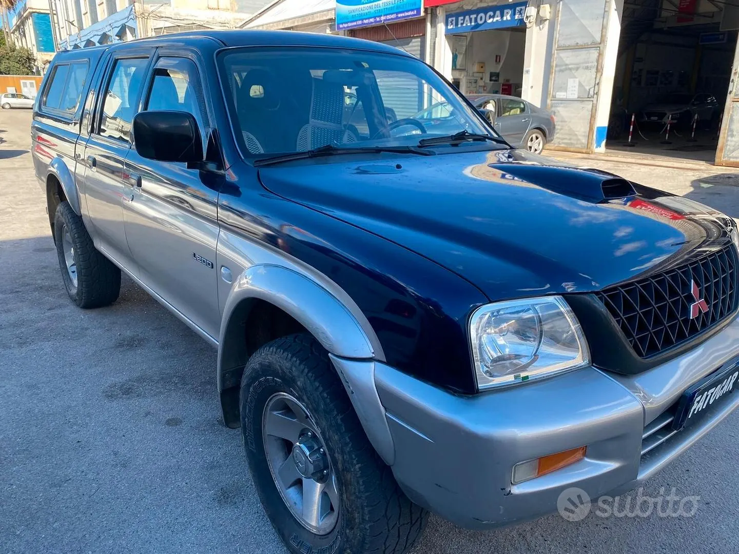 Mitsubishi L200 2004 photo 2