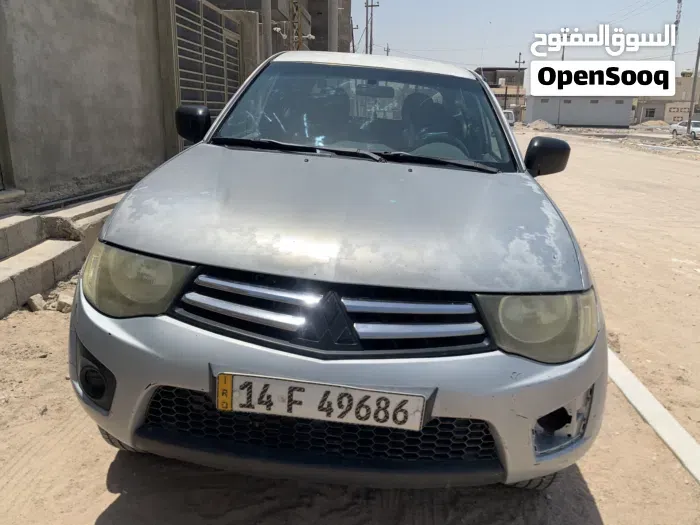 Mitsubishi L200 2014 photo 5