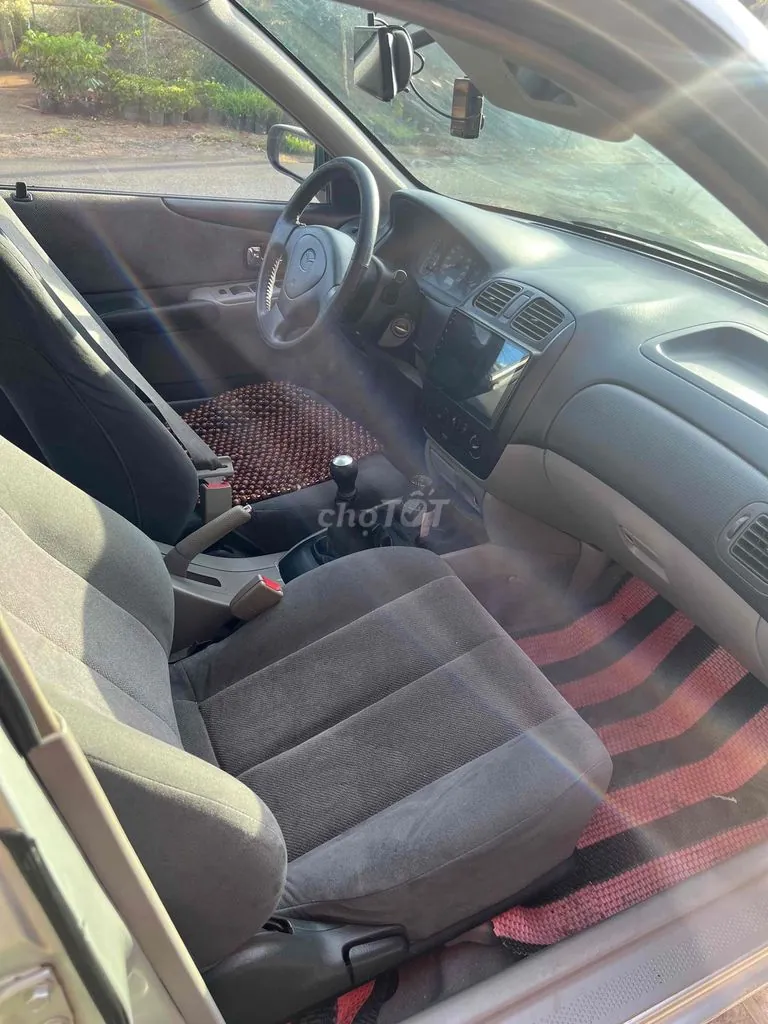 Mazda 323 2002 photo 4