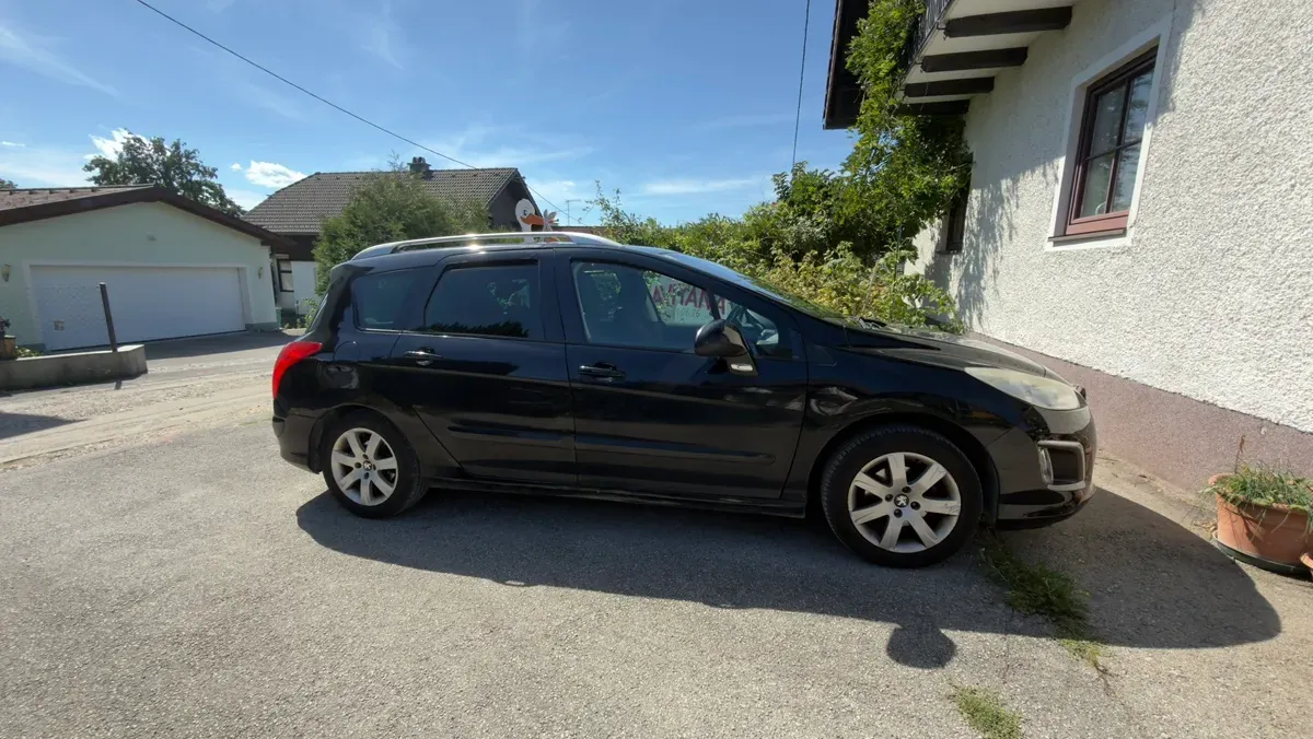 Peugeot 308 2013 photo 2