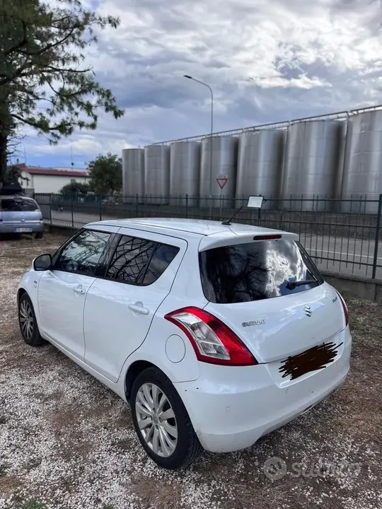 Suzuki Swift 2013 photo 3