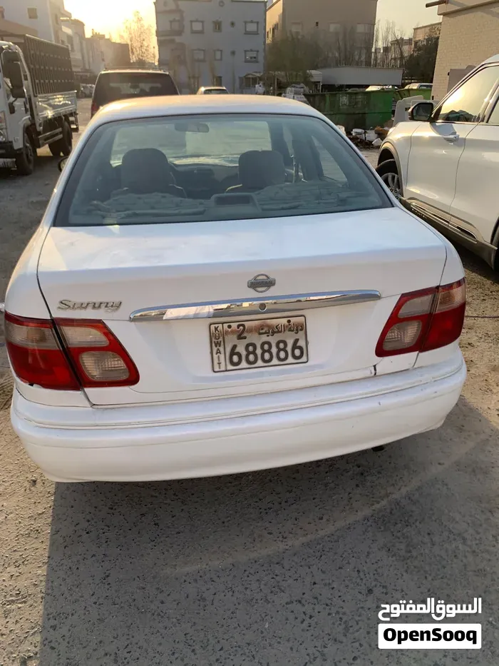 Nissan Sunny 2003 photo 2