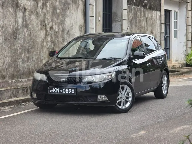 Kia Cerato 2011 photo 2