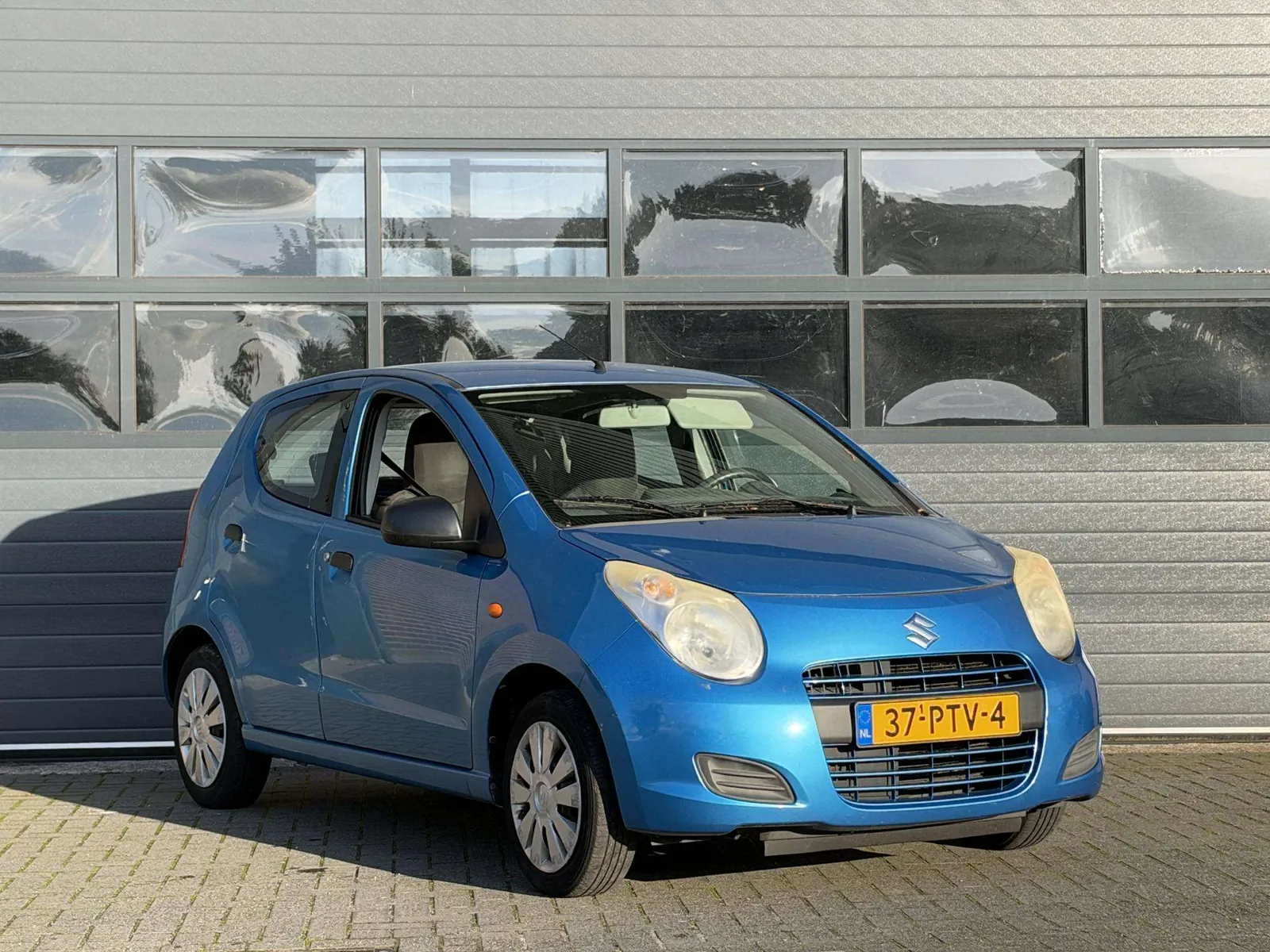 Suzuki Alto 2011 photo 3