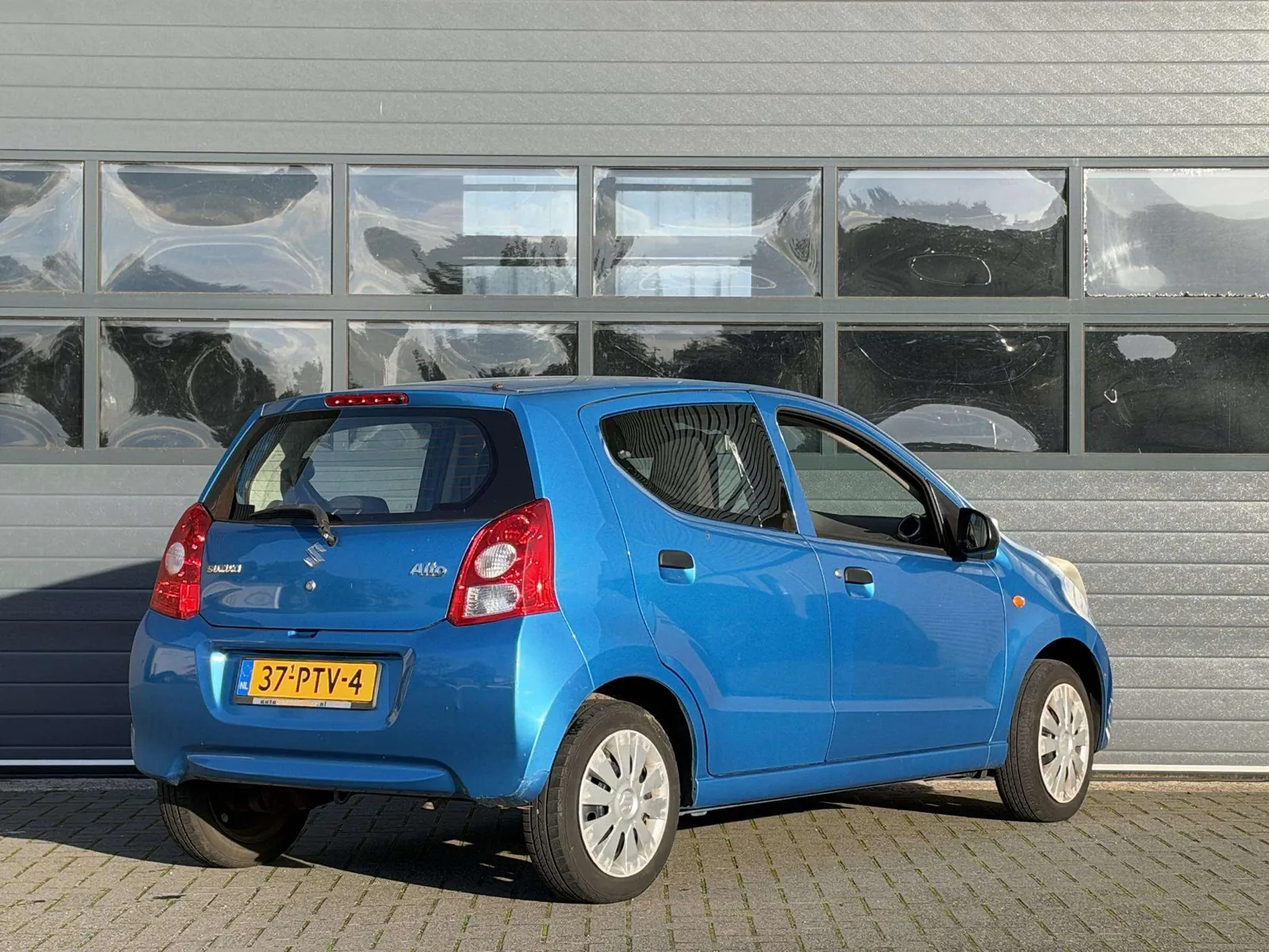 Suzuki Alto 2011 photo 2