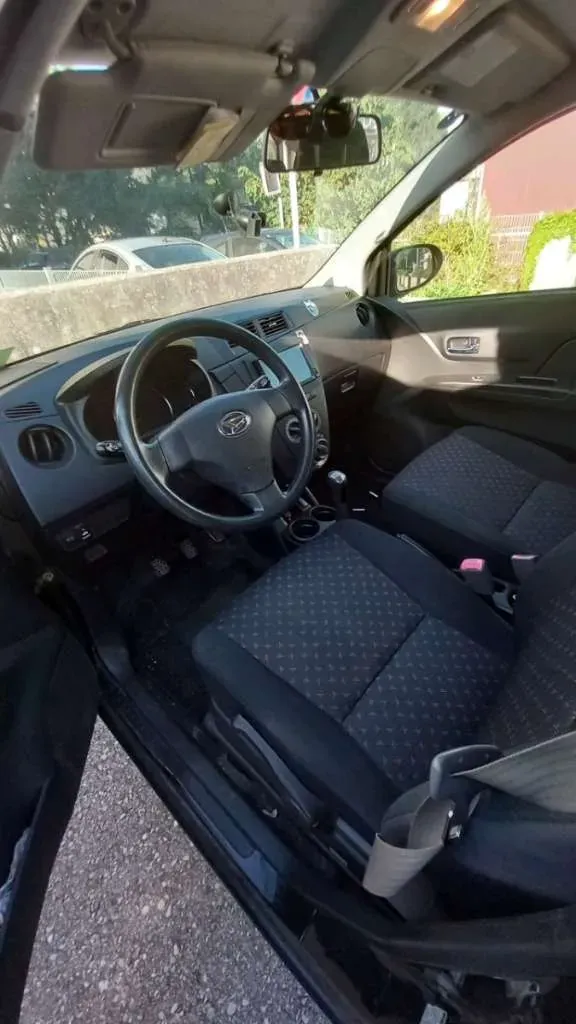 Daihatsu Cuore 2009 photo 3