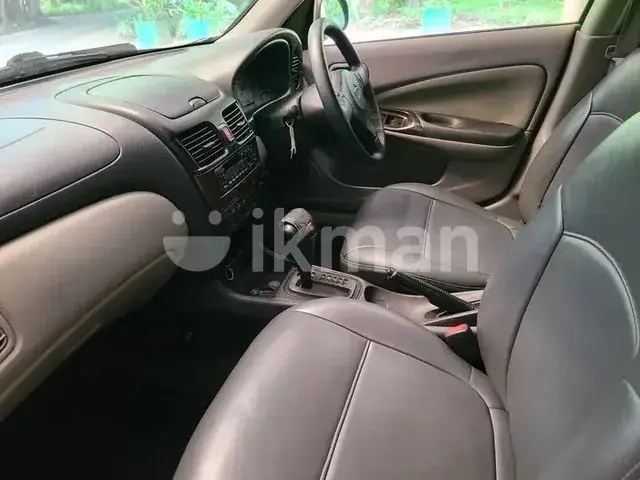 Nissan Sunny 2004 photo 5