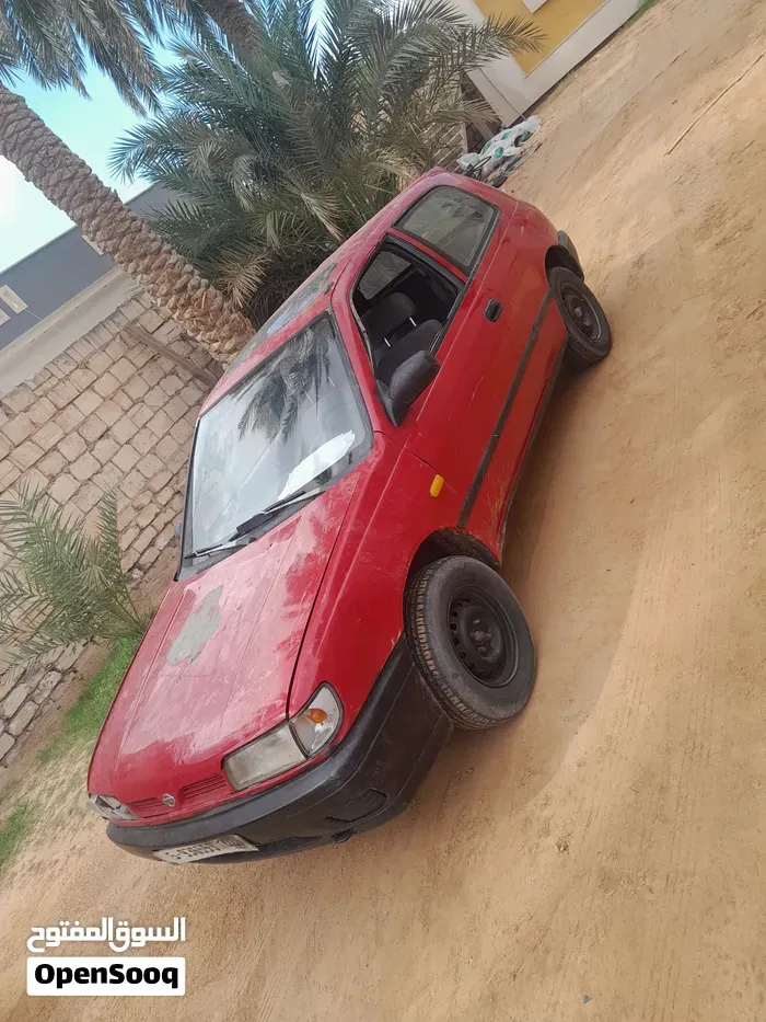 Nissan Almera 1997 photo 4