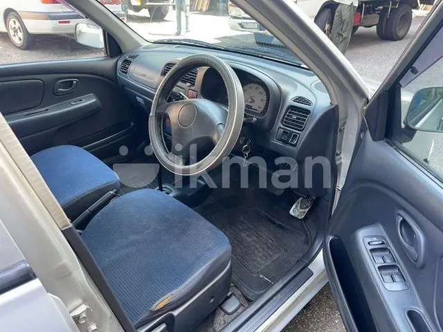 Suzuki Alto 2004 photo 3