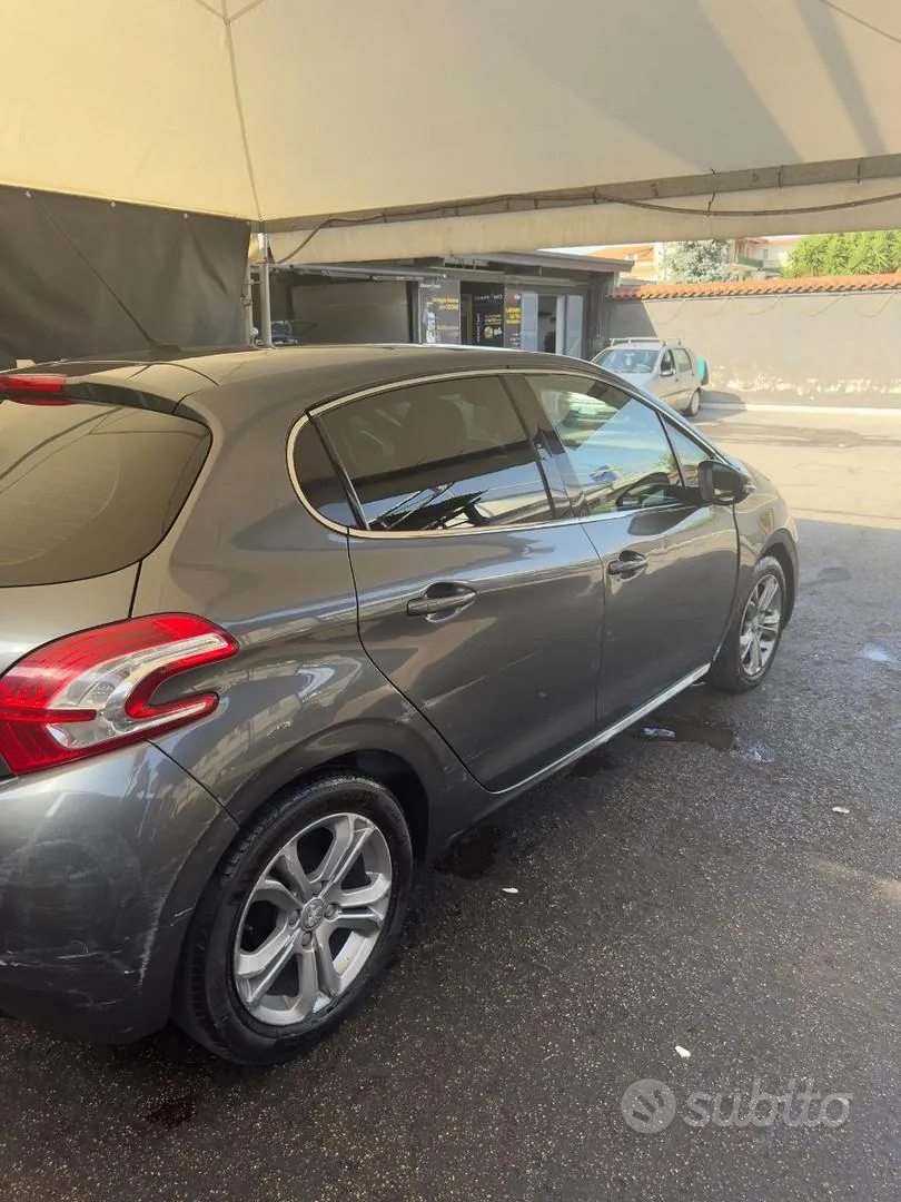 Peugeot 208 2013 photo 3