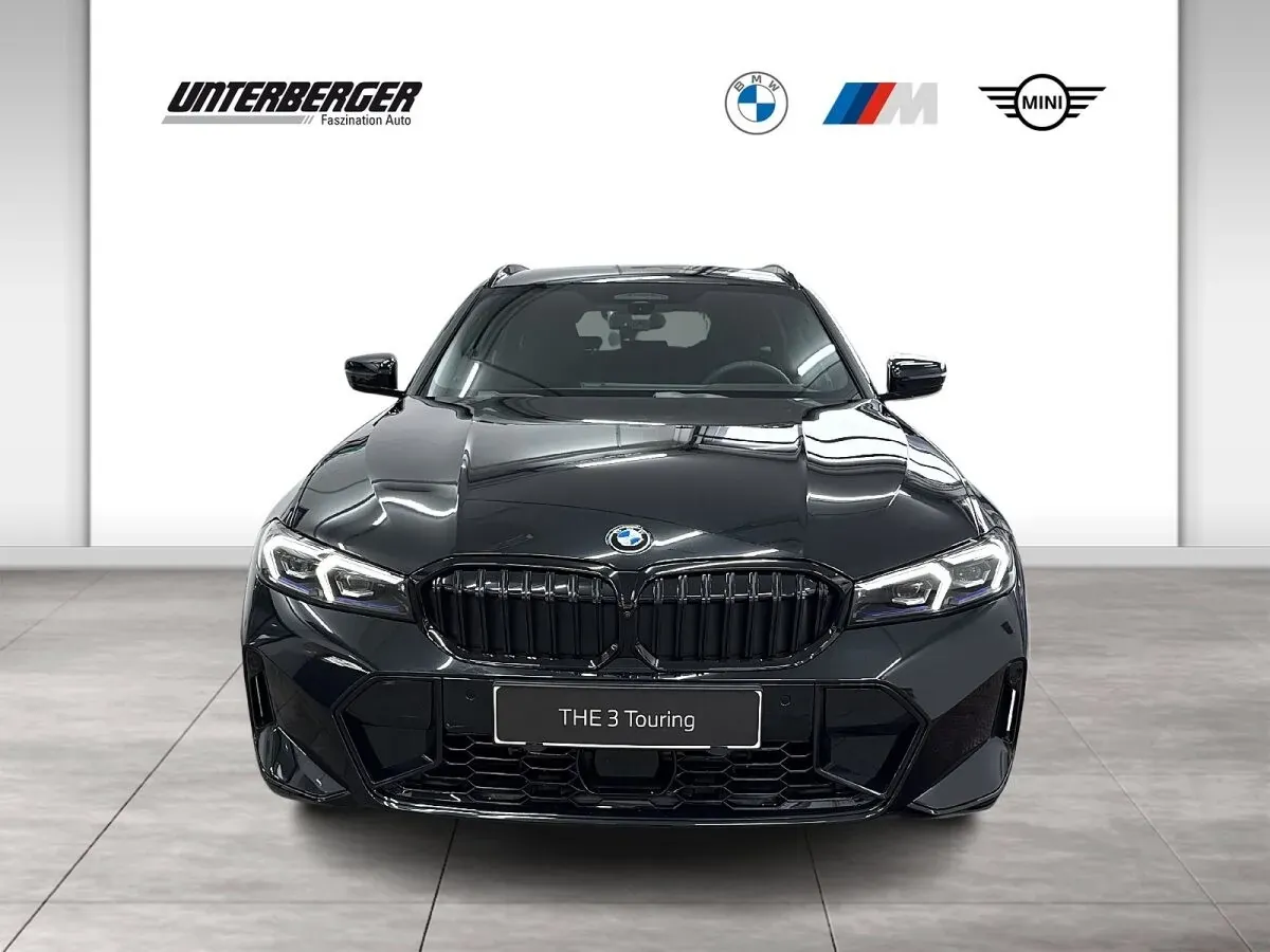 BMW 3 Series photo 2