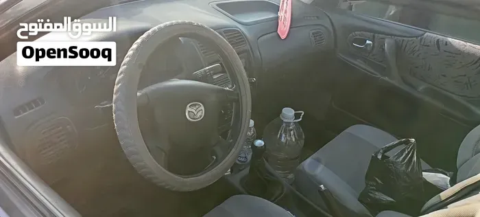 Mazda 323 2002 photo 4