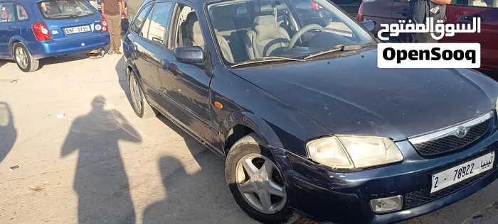 Mazda 323 2002 photo 2