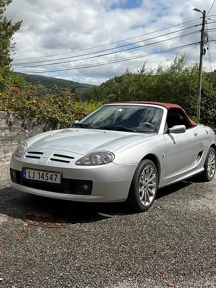 MG Tf