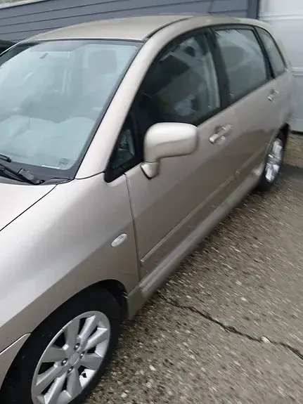 Suzuki Liana 2004 photo 3