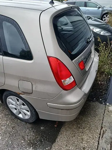 Suzuki Liana 2004 photo 4