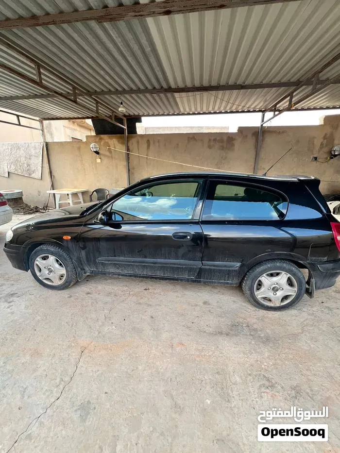 Nissan Almera 2002 photo 2