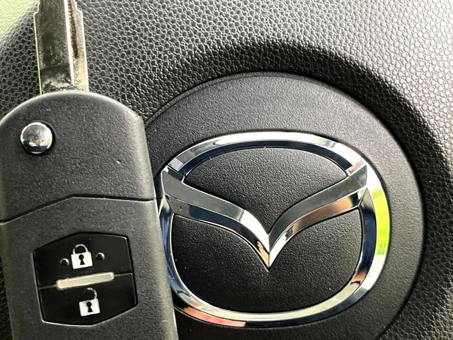 Mazda Demio 13C-V 2012 photo 5