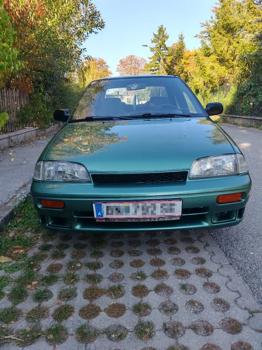 Suzuki Swift 1990 photo 2