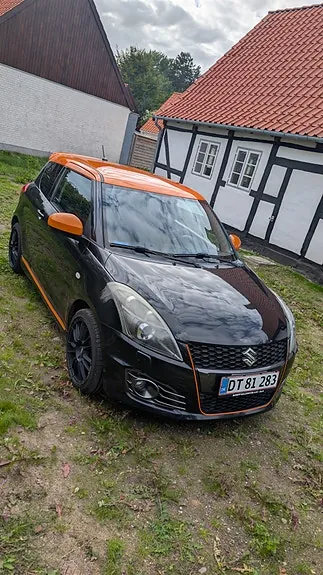 Suzuki Swift 2012 photo 2