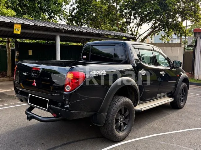 Mitsubishi L200 2007 photo 3