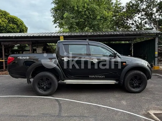Mitsubishi L200 2007 photo 4