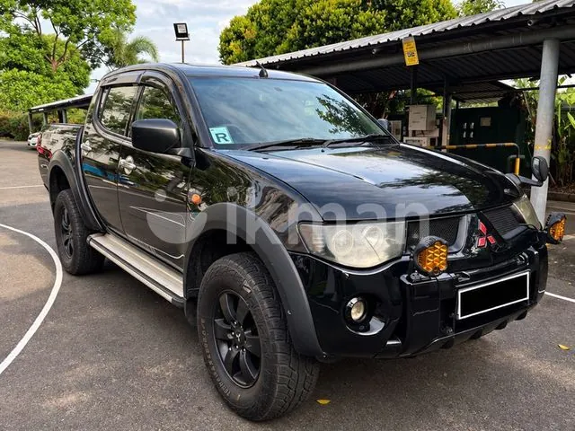 Mitsubishi L200 2007 photo 2
