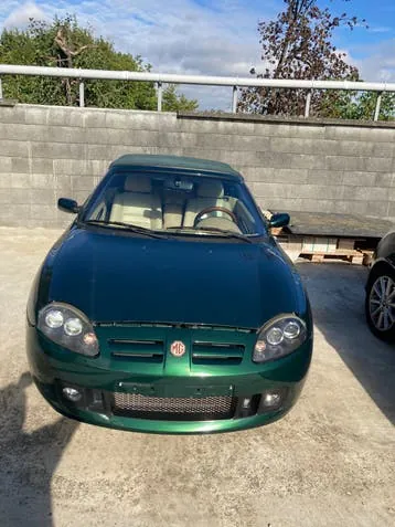 MG Tf