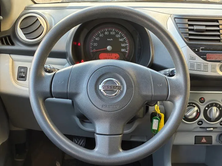 Nissan Pixo 2010 photo 2