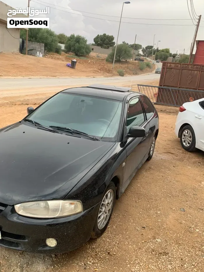 Mitsubishi Colt 2004 photo 2