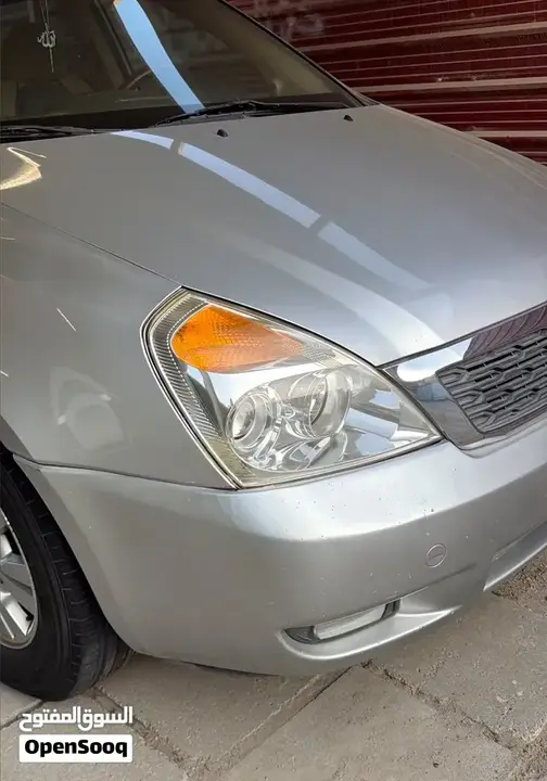 Kia Carnival 2013 photo 2