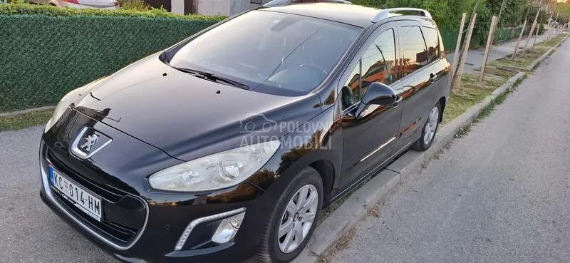 Peugeot 308 2011 photo 2